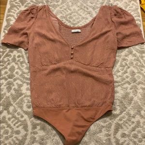 Abercrombie body suit. Never worn.